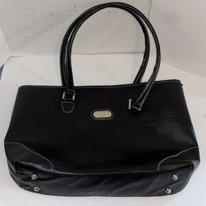 BOB MACKIE TOTE BAG VEGAN LEATHER
ZIPPER CLOSURE ON TOP
LINING INSIDE CLEAN